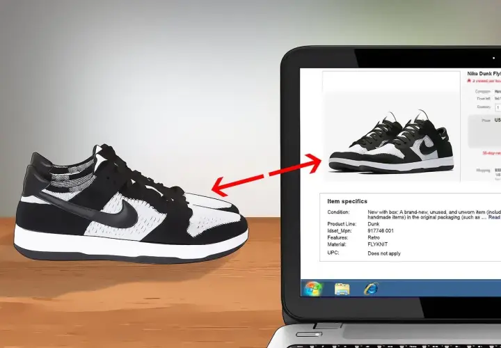 Schwarze und weiße Nike Dunk Flyknit Sneaker werden auf einem Laptop-Bildschirm gezeigt, um das Nike Modell herausfinden.