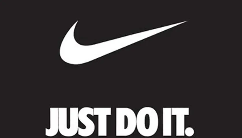 Nike Swoosh und der Slogan "JUST DO IT." auf schwarzem Hintergrund. Ein Aufruf zum Handeln, um deine Ziele zu verfolgen.